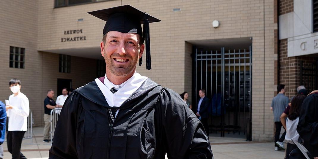 Brooks Orpik wearing a graduation cap and gown